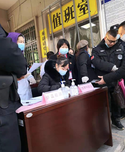 邹晖近期彩色工作照（2020年12月20日督查庭审外围安保和防疫工作情况）.jpg