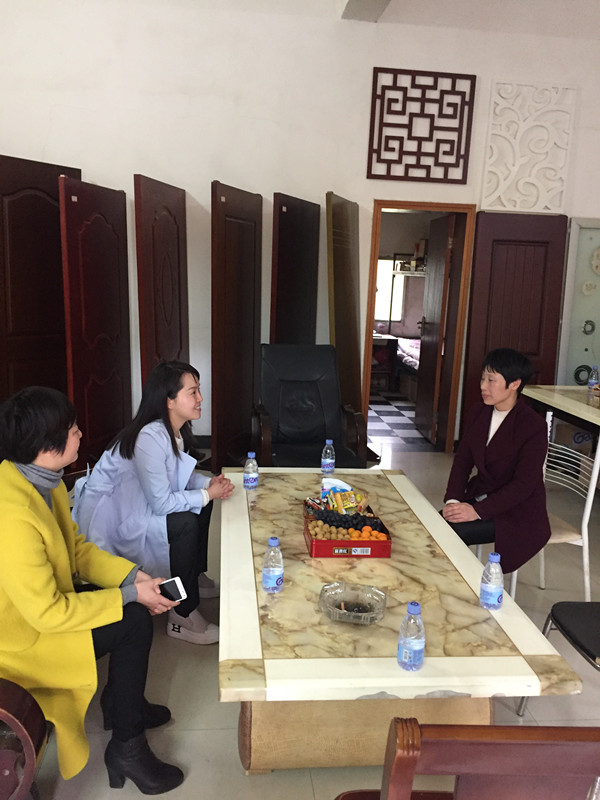 走访廖玉平家庭.jpg